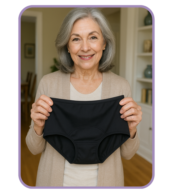 Woman holding a black underwear in a home setting